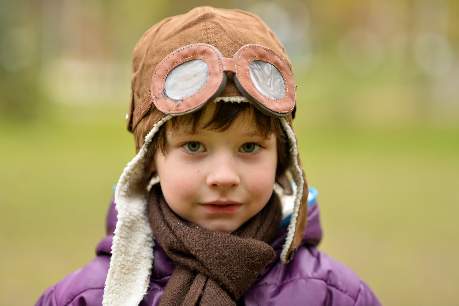 imaginative and confident child wearing a pilot's outfit