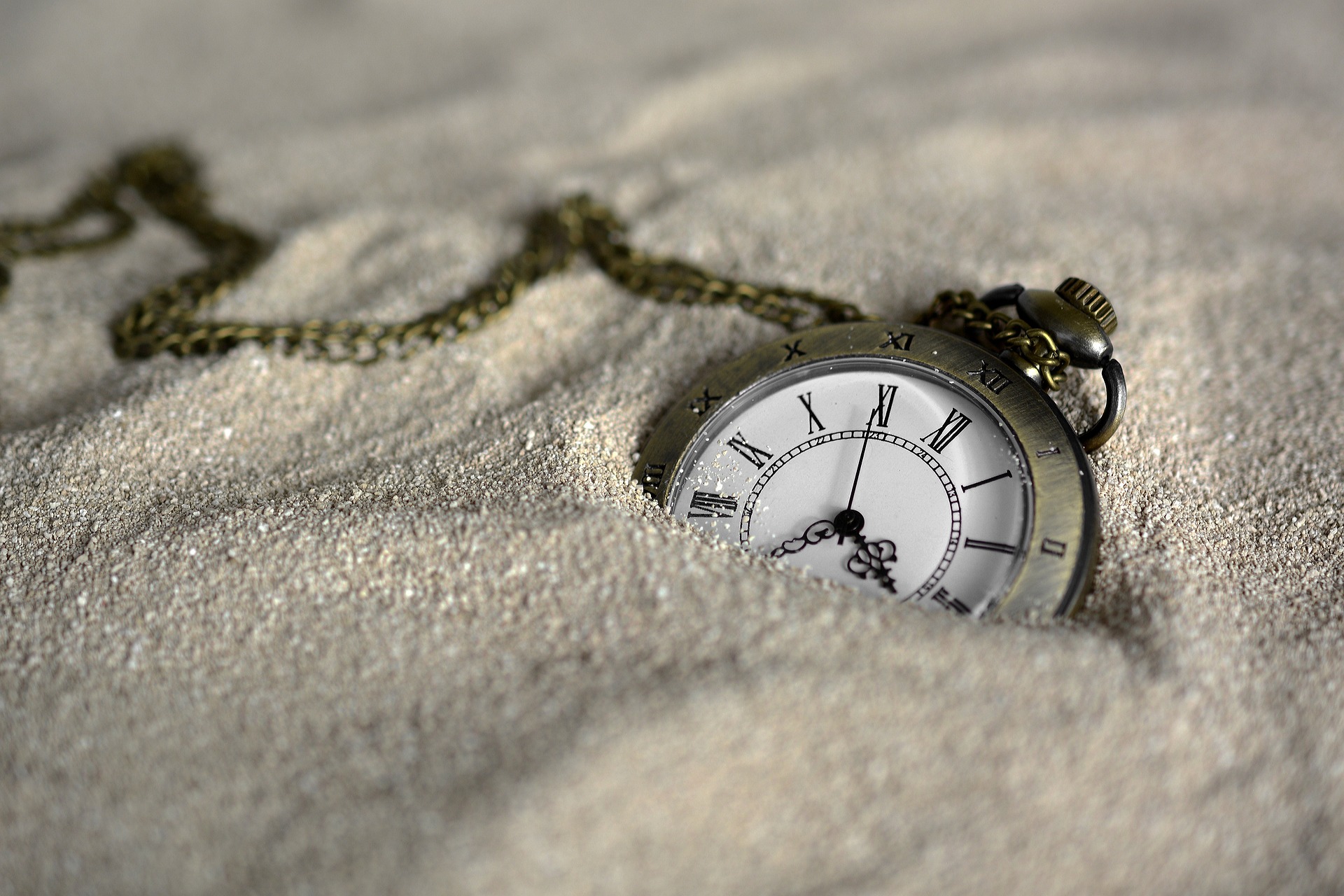 a watch in the sand